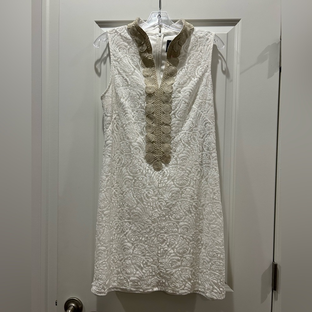 Vince Camuto white sleeveless dress.